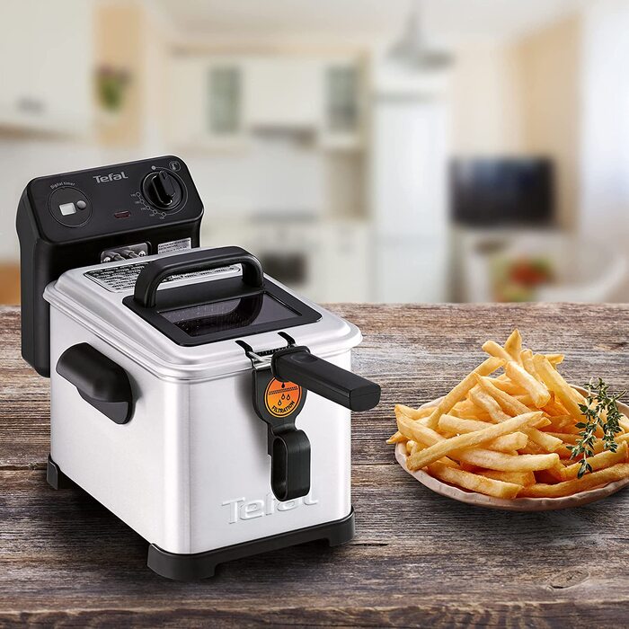 Лектрическая фритюрница Tefal FR5160 Filtra Pro / емкость для масла 4 л Фильтр для сбора более чистого масла детали, пригодне для мтья в посудомоечной машине Смотровое окно регулируемй контроль температур / Чернй/нержавеющая сталь